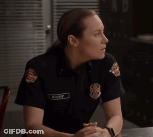 A Woman In A Firefighter Uniform Has The Name T. Bishop On Her Badge GIF