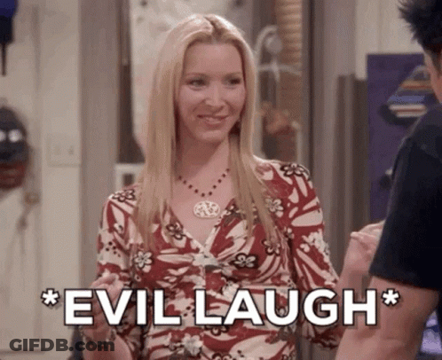 A Woman In A Floral Dress Is Smiling And Laughing While Standing Next To A Man . GIF