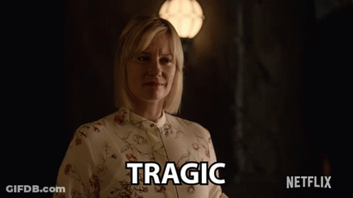 A Woman In A Floral Shirt Says Tragic In A Netflix Advertisement GIF