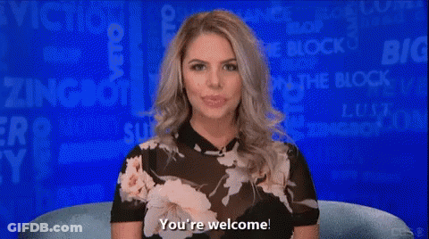 A Woman In A Floral Top Is Sitting In Front Of A Blue Background And Says You 'Re Welcome GIF
