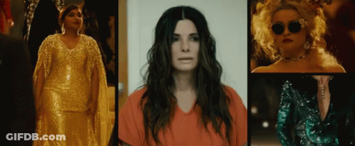 A Woman In A Gold Dress Is Standing Next To A Woman In A Red Shirt GIF