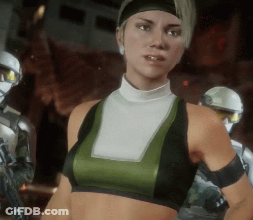 A Woman In A Green And Black Crop Top Stands In Front Of A Robot GIF