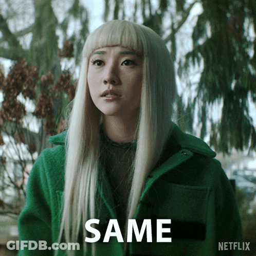 A Woman In A Green Coat Says Same GIF