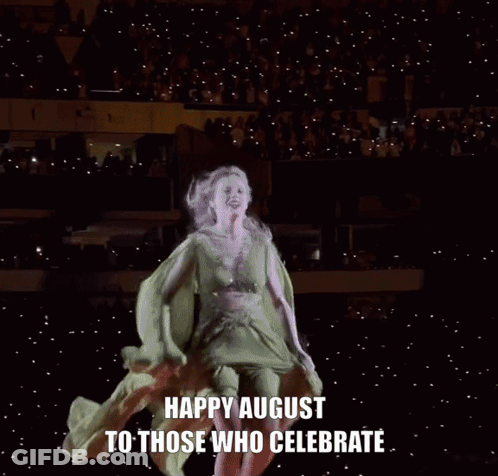 A Woman In A Green Dress Is Dancing With The Words Happy August To Those Who Celebrate GIF