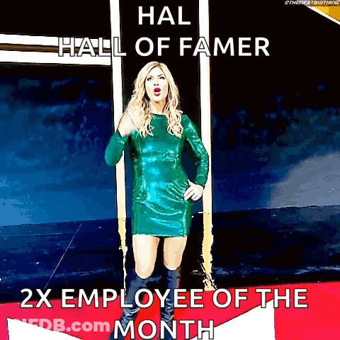 A Woman In A Green Dress Is Standing On A Red Carpet With The Words Hall Of Famer 2X Employee Of The Month GIF