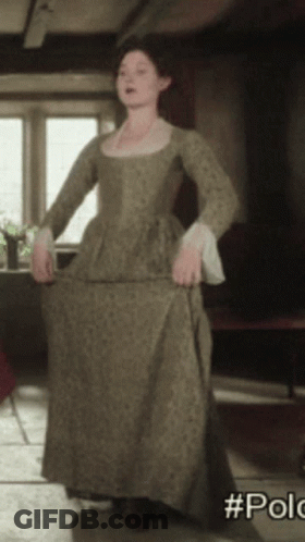 A Woman In A Green Dress With The Hashtag #Polo On The Bottom Right GIF