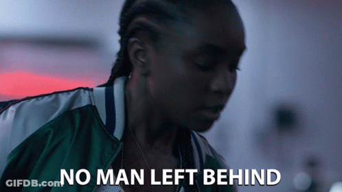 A Woman In A Green Jacket With The Words No Man Left Behind GIF