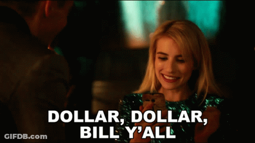 A Woman In A Green Sequined Dress Is Holding A Cell Phone And Says " Dollar Dollar Bill Y'all " GIF