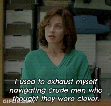 A Woman In A Green Shirt Is Sitting At A Desk And Says I Used To Exhaust Myself Navigating Crude GIF