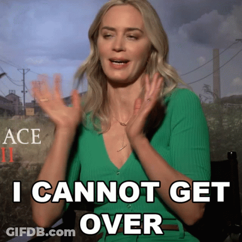 A Woman In A Green Shirt Says " I Cannot Get Over " With Her Hands In The Air GIF