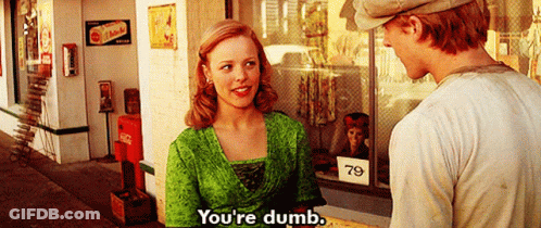 A Woman In A Green Top Says You 'Re Dumb While Talking To A Man GIF