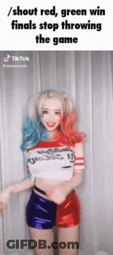 A Woman In A Harley Quinn Costume Is Throwing A Game GIF