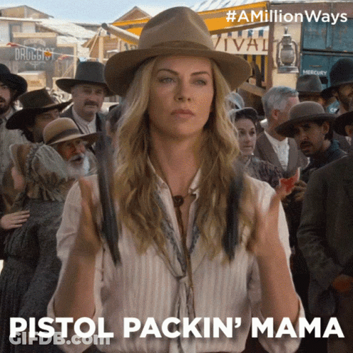 A Woman In A Hat Holds A Gun And Says Pistol Packin Mama GIF