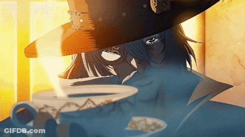 A Woman In A Hat Is Drinking From A Cup Of Coffee GIF