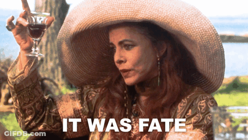A Woman In A Hat Is Holding A Glass Of Wine And The Words It Was Fate Are Below Her GIF