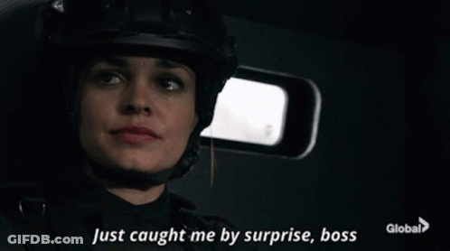 A Woman In A Helmet Is Saying Just Caught Me By Surprise Boss GIF