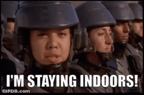 A Woman In A Helmet Says I 'M Staying Indoors . GIF