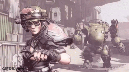 A Woman In A Helmet Stands Next To A Robot In A Video Game GIF