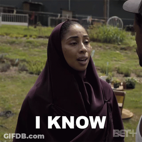 A Woman In A Hijab Says " I Know " In Front Of A Man GIF