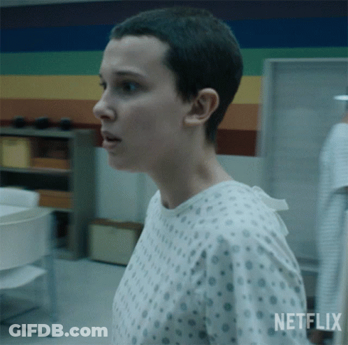 A Woman In A Hospital Gown With The Word Netflix On The Bottom GIF