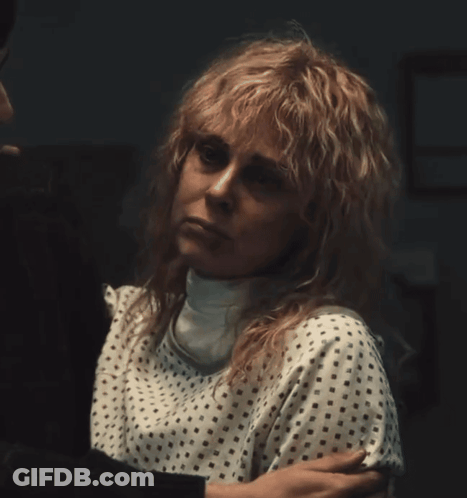 A Woman In A Hospital Gown With The Words " And Did " Written Above Her GIF