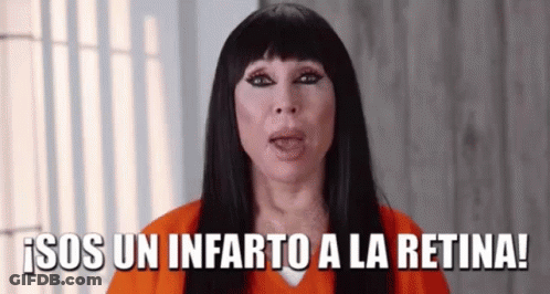 A Woman In A Jail Cell Is Making A Funny Face And Says `` Sos Un Infarto A La Retina ! '' GIF