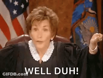 A Woman In A Judge 'S Robe Is Sitting In Front Of An American Flag And Saying `` Well Duh '' . GIF