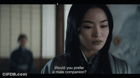 A Woman In A Kimono Is Asking If She Would Prefer A Male Companion GIF