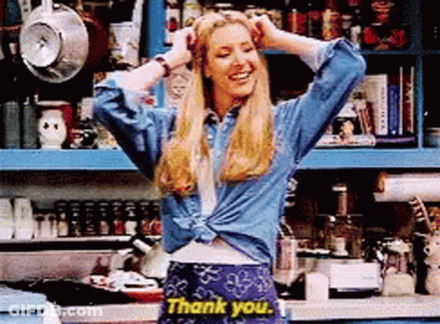 A Woman In A Kitchen Says Thank You GIF