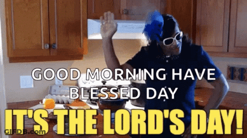 A Woman In A Kitchen With The Words `` Good Morning Have Blessed Day It 'S The Lord 'S Day ! '' GIF