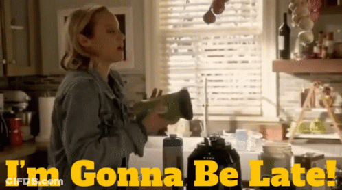 A Woman In A Kitchen With The Words " I 'M Gonna Be Late " On The Bottom GIF