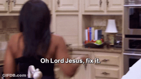 A Woman In A Kitchen With The Words Oh Lord Jesus Fix It GIF