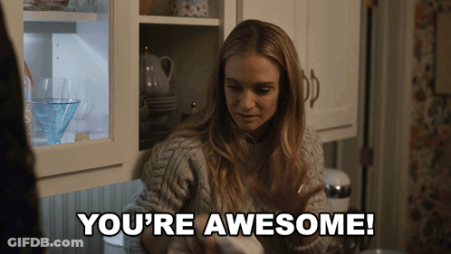 A Woman In A Kitchen With The Words You 'Re Awesome GIF