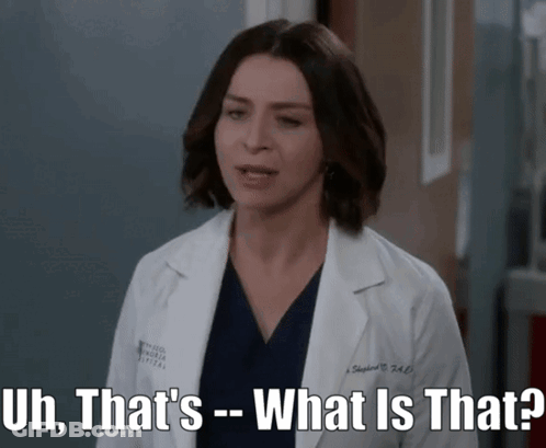 A Woman In A Lab Coat Is Asking " What Is That " GIF