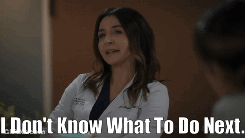 A Woman In A Lab Coat Says I Do N't Know What To Do Next GIF