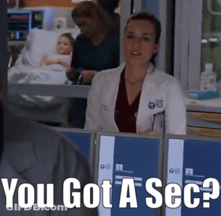 A Woman In A Lab Coat Says " You Got A Sec " In A Hospital Room GIF