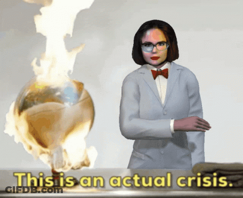 A Woman In A Lab Coat Stands In Front Of A Burning Globe With The Words This Is An Actual Crisis GIF