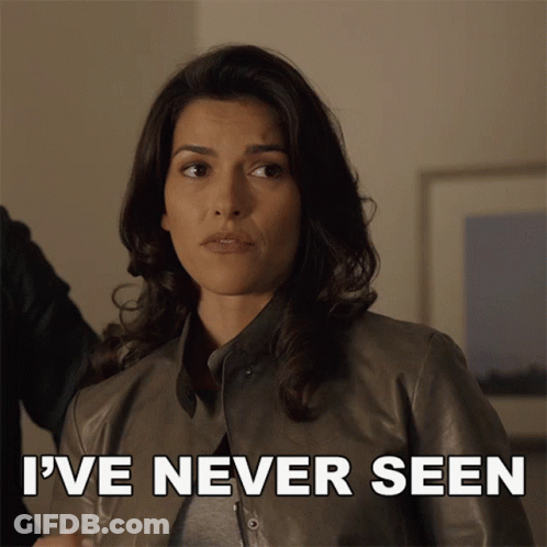A Woman In A Leather Jacket Has The Words I 'Ve Never Seen Written Below Her GIF
