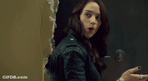 A Woman In A Leather Jacket Is Giving The Middle Finger And The Word Silence Is Behind Her GIF
