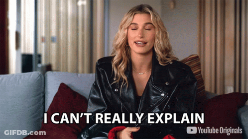 A Woman In A Leather Jacket Is Sitting On A Couch And Saying I Can 'T Really Explain GIF