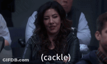 A Woman In A Leather Jacket Says Cackle GIF