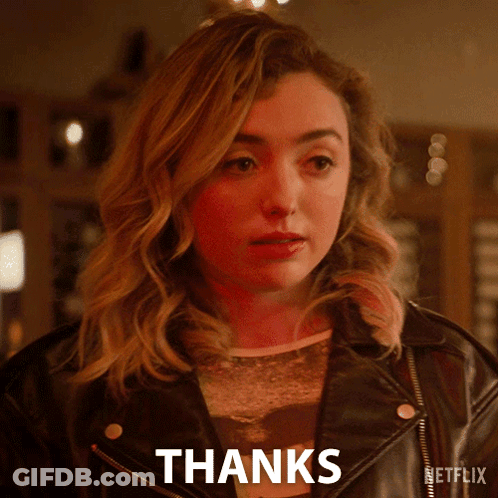 A Woman In A Leather Jacket Says " Thanks " GIF