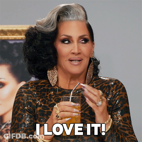 Woman In Leopard Print Dress Drinking Through Straw GIF