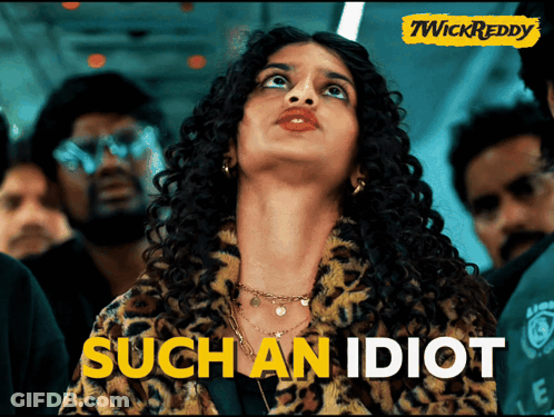 A Woman In A Leopard Print Jacket With The Words Such An Idiot Written On The Bottom GIF