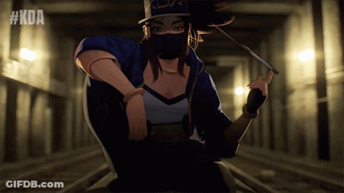 A Woman In A Mask Is Holding A Knife In A Dark Room With #Kda Written Above Her GIF