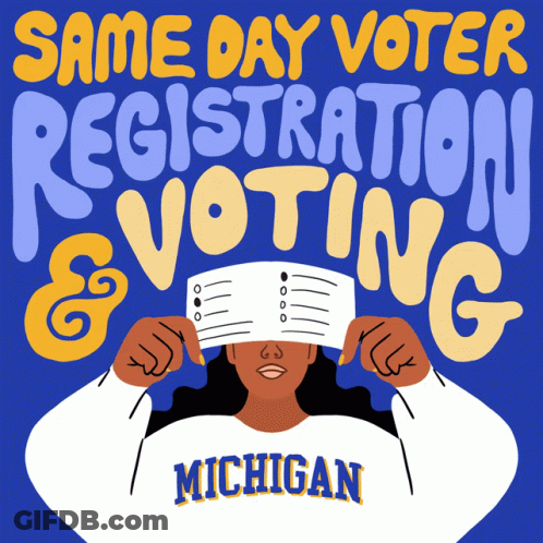 A Woman In A Michigan Shirt Is Holding A Ballot In Front Of Her Face GIF
