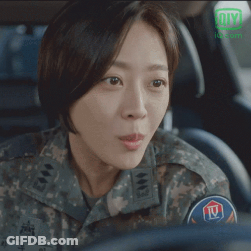 Woman In Military Uniform With IV Patch GIF