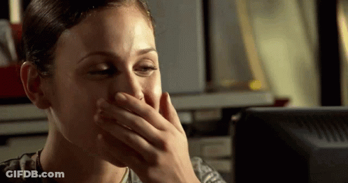 Woman In Military Covering Mouth GIF