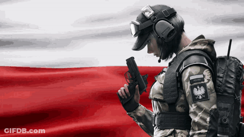 A Woman In A Military Uniform Is Holding A Gun GIF