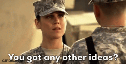 Woman In Military Uniform Talking To Man And Asking For Ideas GIF